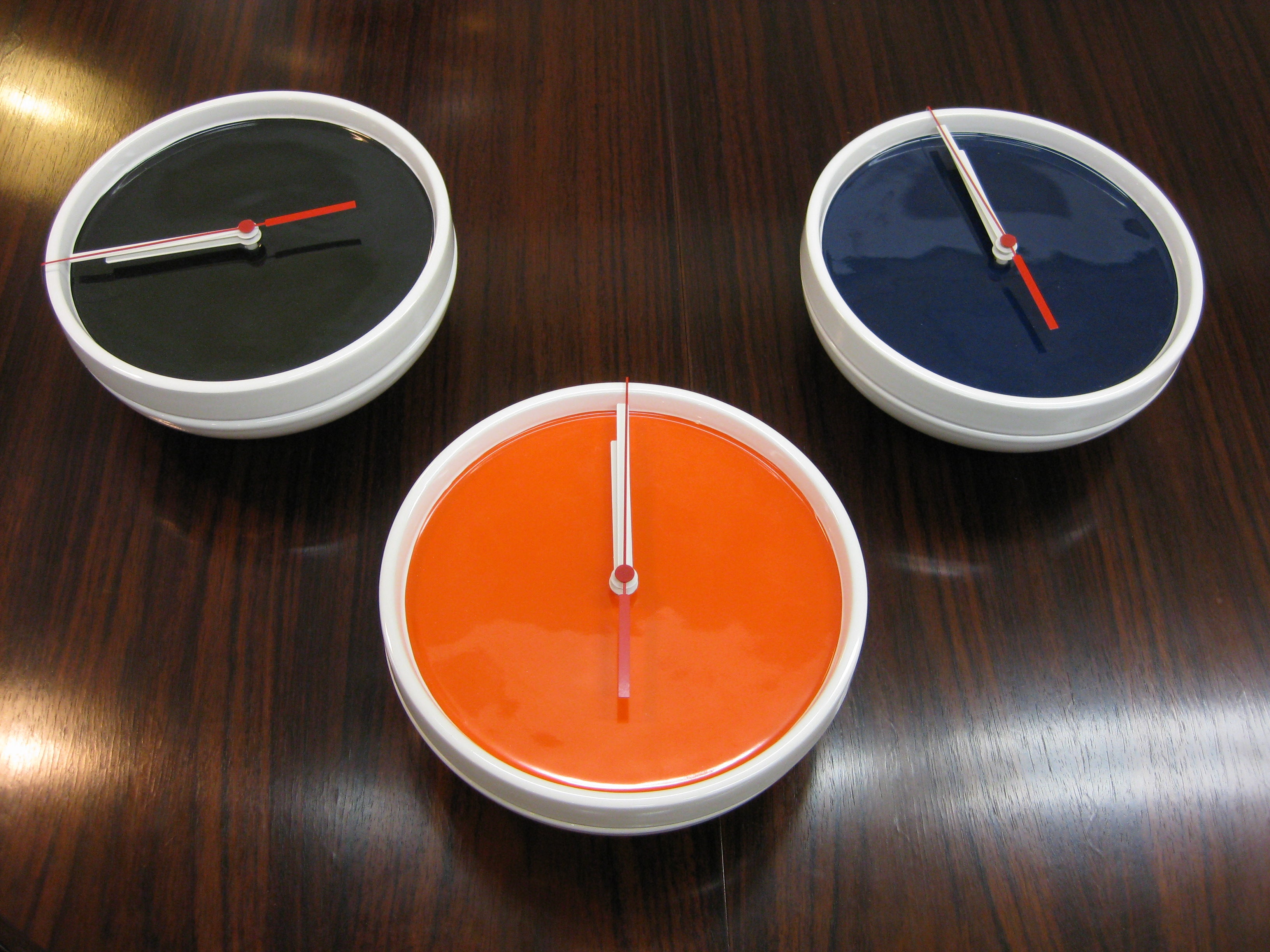 Slice Wall clock white (orange, black or blue)